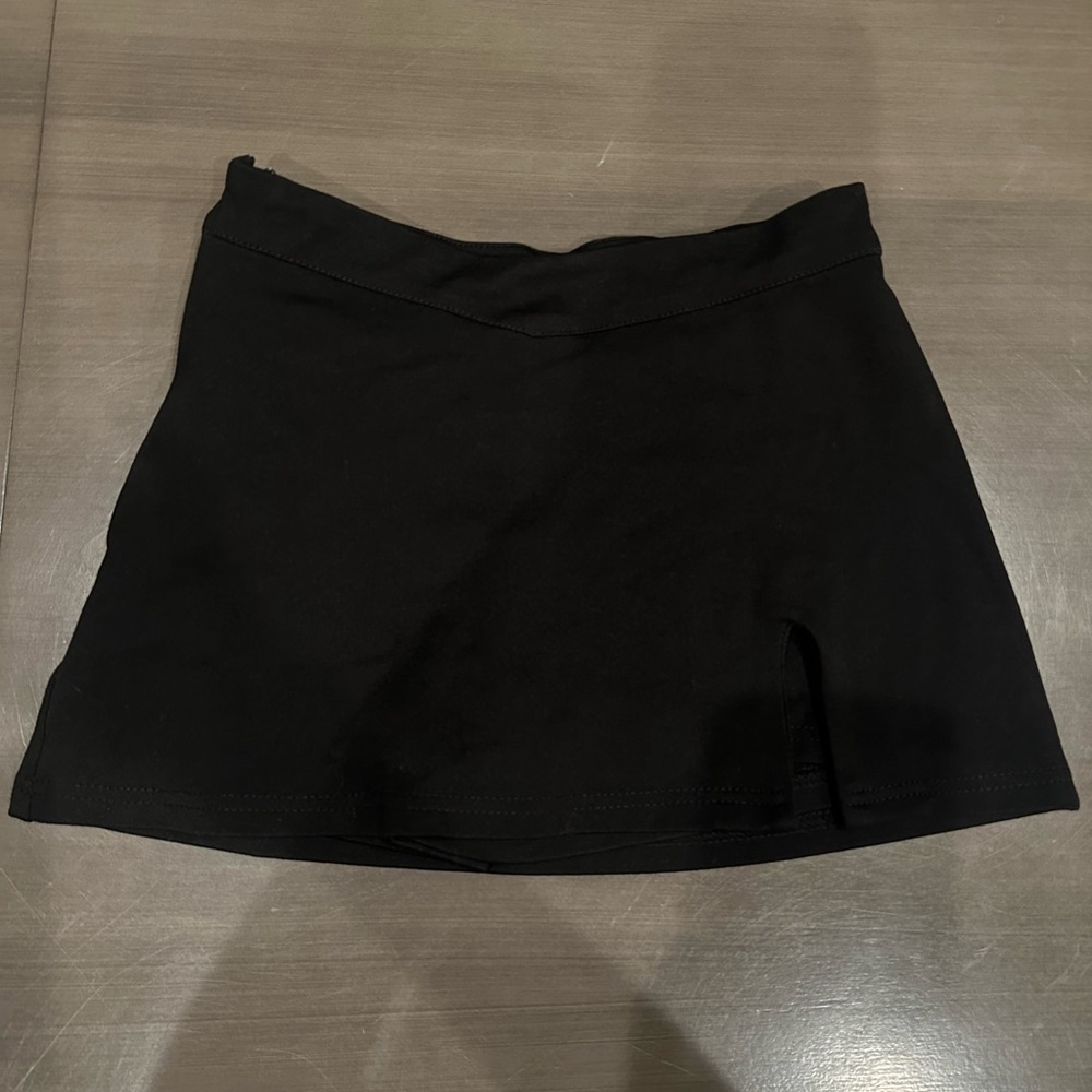 Black v shaped mini skirt with shorts underneath size small